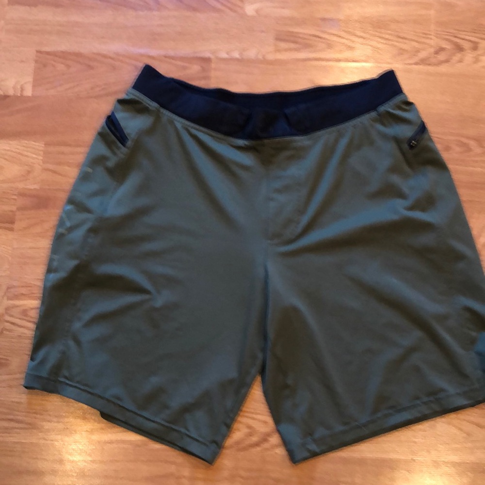 Hylete green shorts, above the knee length